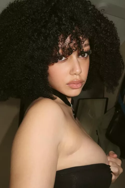 I'm your black magic woman, Pulling you in with just one look.