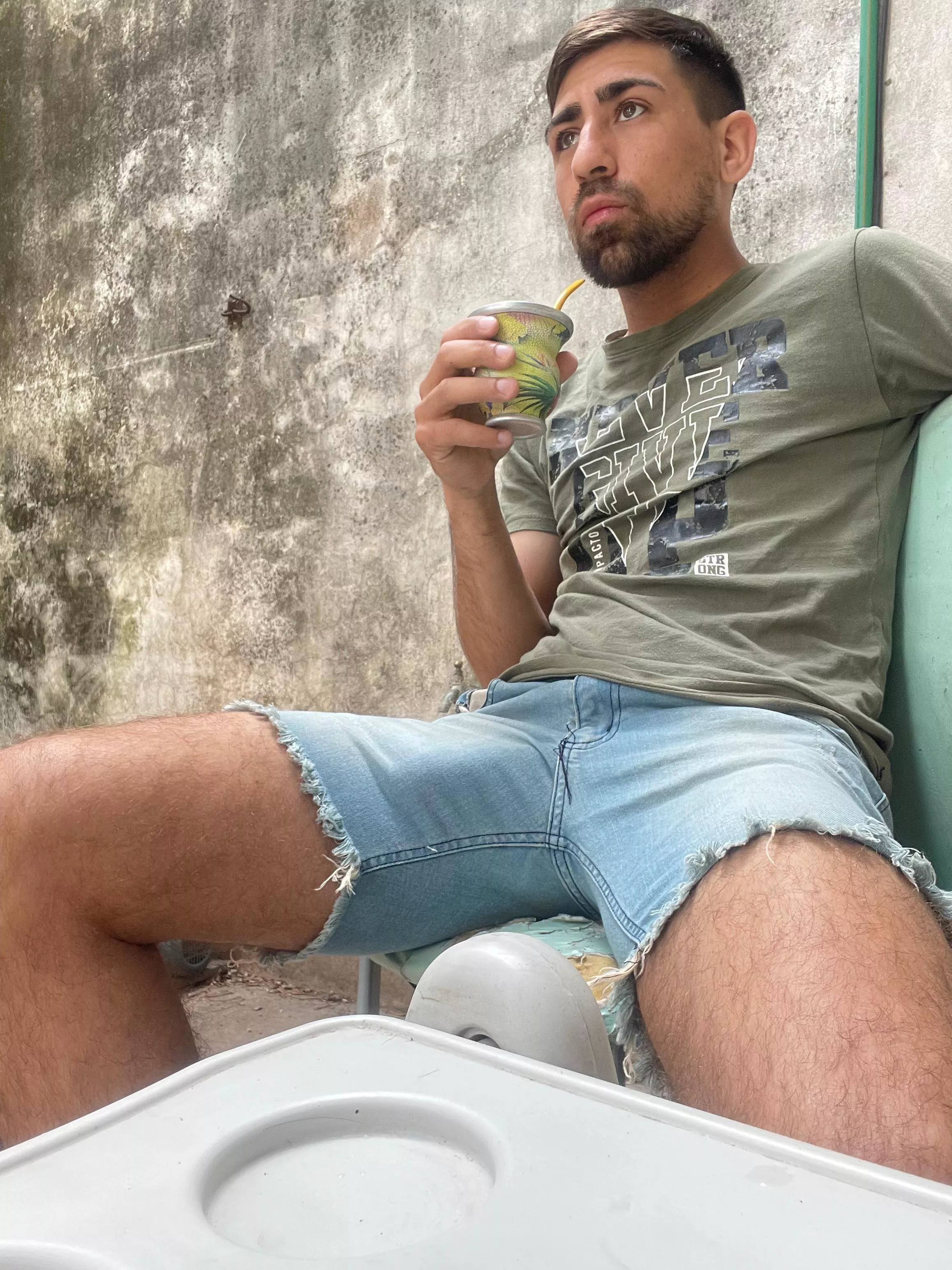 My girlfriend took this photo of me when I was looking and listening attentively to her mother while we were sharing a mate (typical drink from our country Argentina)