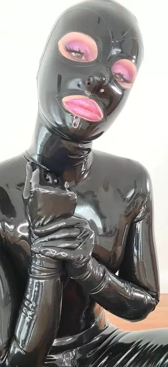 Covered in shiny latex
