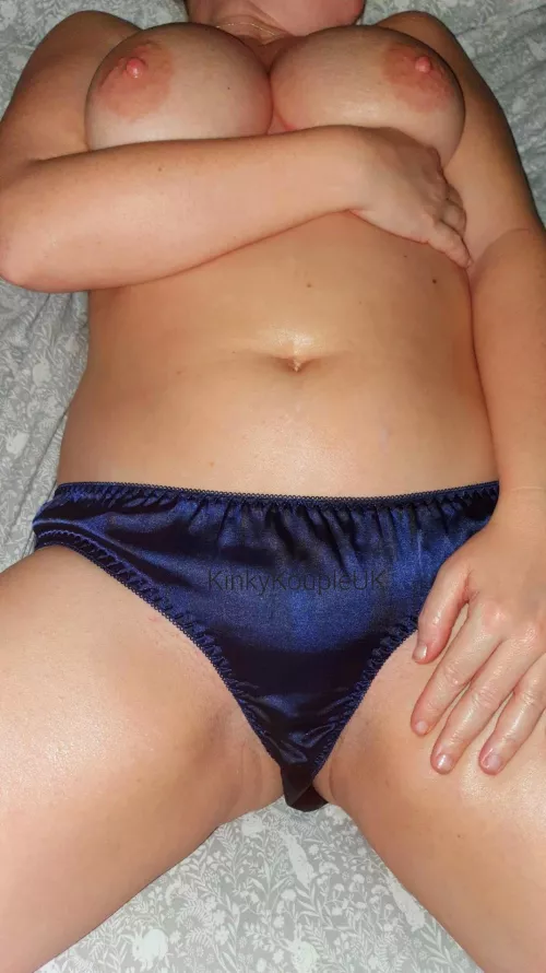 I hope my boobs don't distract you from my satin panties.