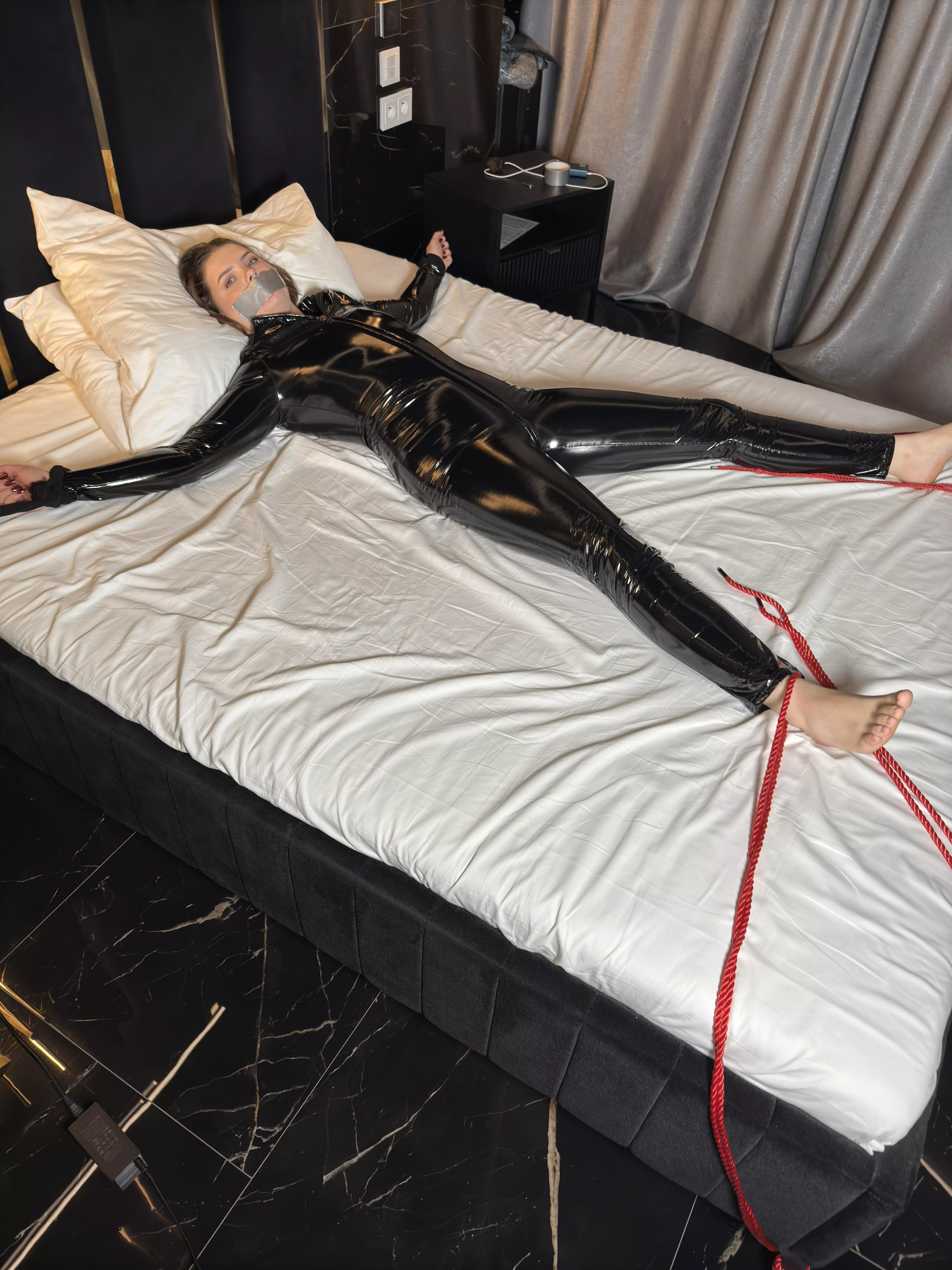 Tied to bed very strictly