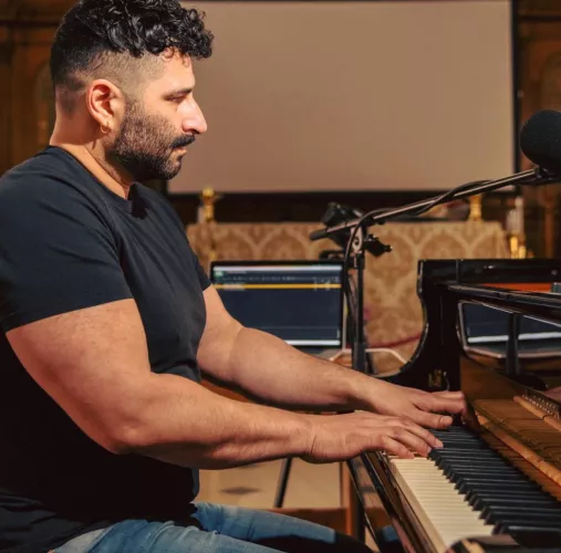 Gay bro at work doing gay made-up job: session pianist at abbey road (where everybody famous recorded everything) 