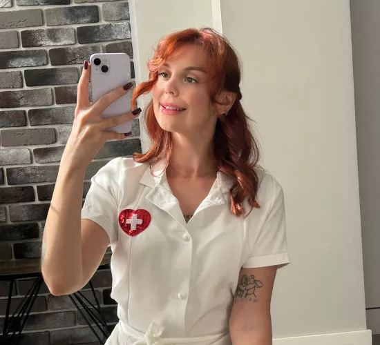 Just a redhead in white robe