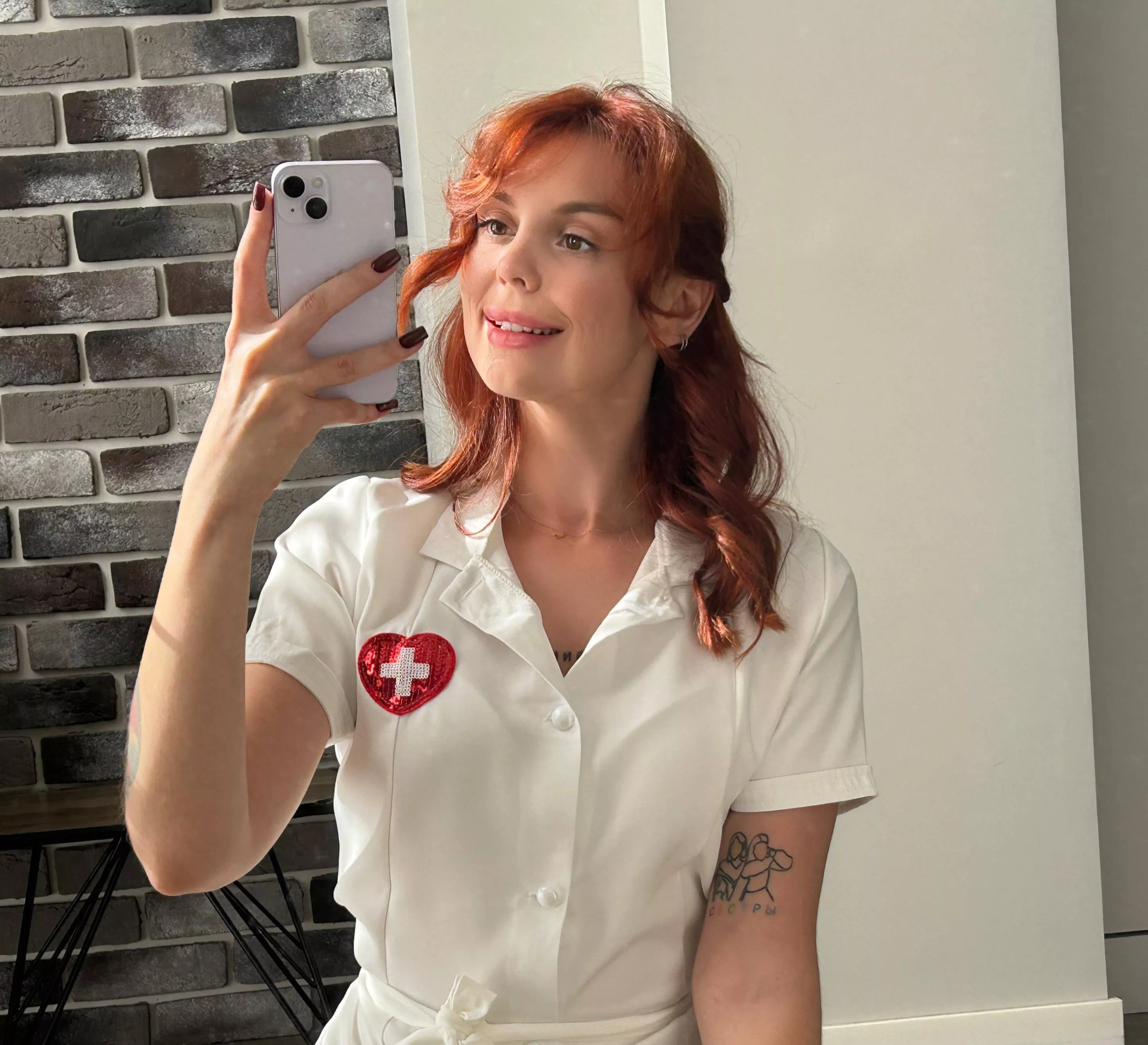 Just a redhead in white robe