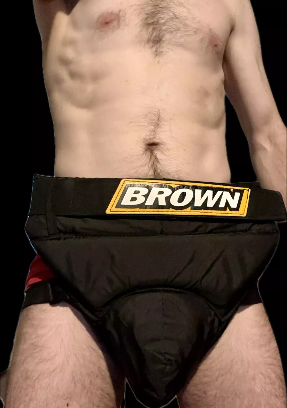 Brown hockey goalie cup