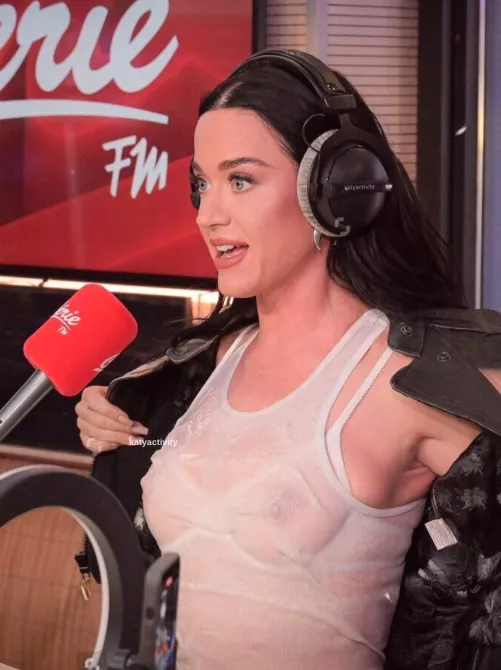 Katy Perry Again - the wet tshirt look for her latest new album publicity stunt. We'll take it!