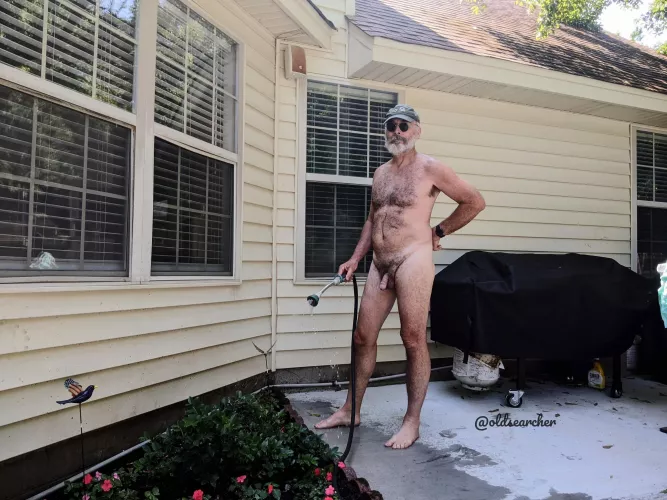 Watering my patio garden in spring