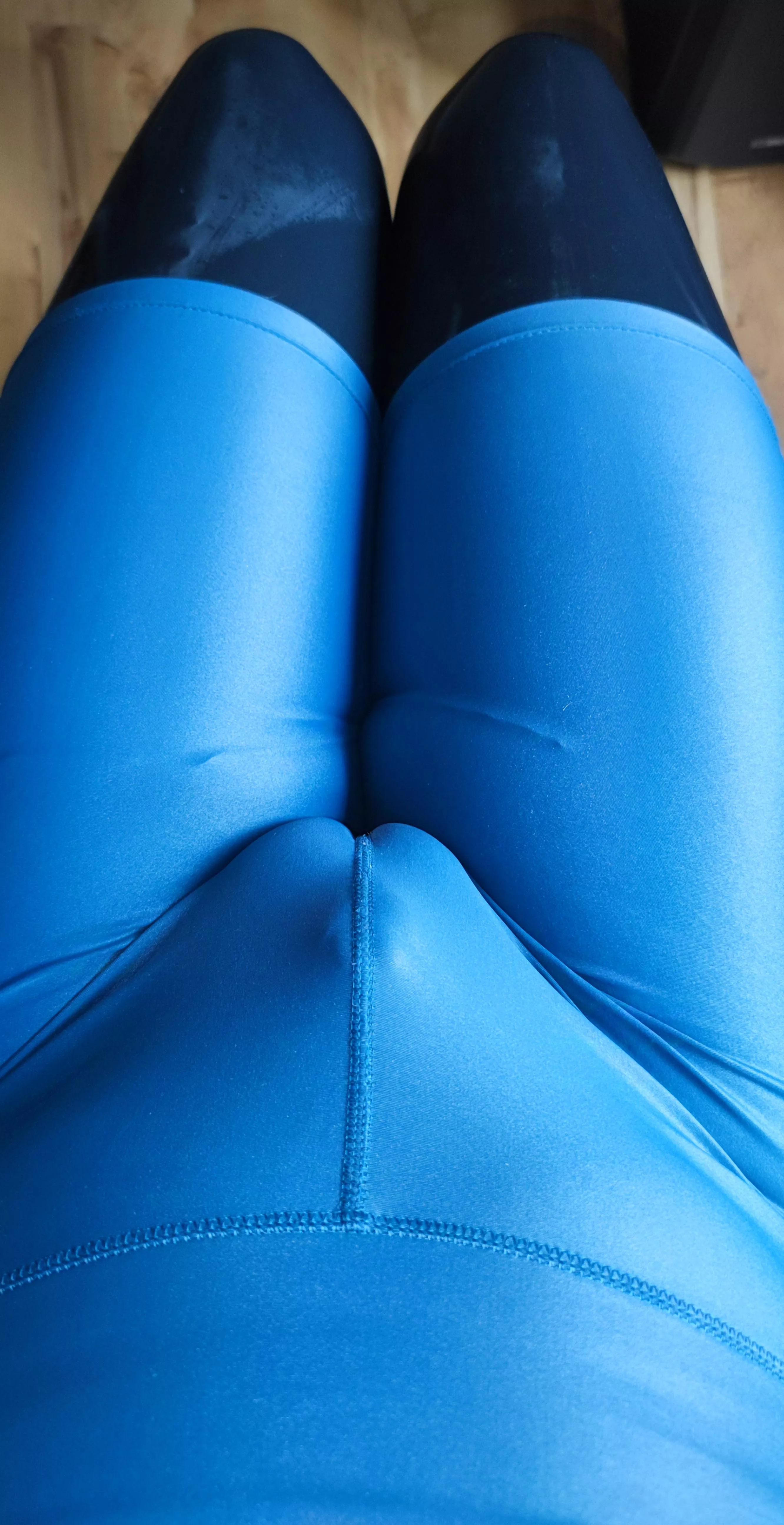 Blue shorts over black latex is great.. 🐶🫣