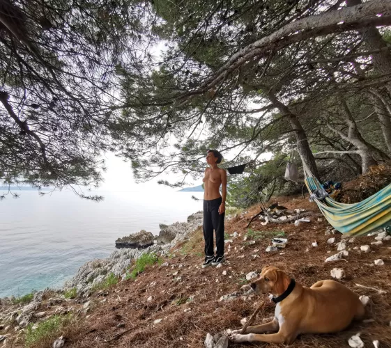 Hiking break under the pine trees on the beach