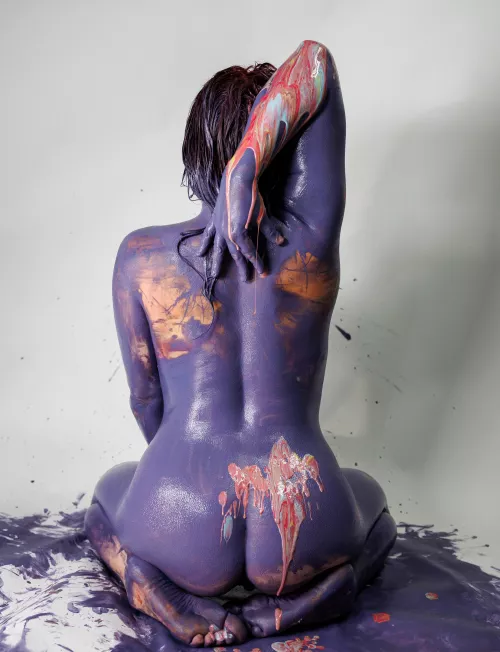 I was given the opportunity to be a canvas for a local artist. He did a few different paint pours on my body. This was one of my favorite shots. 