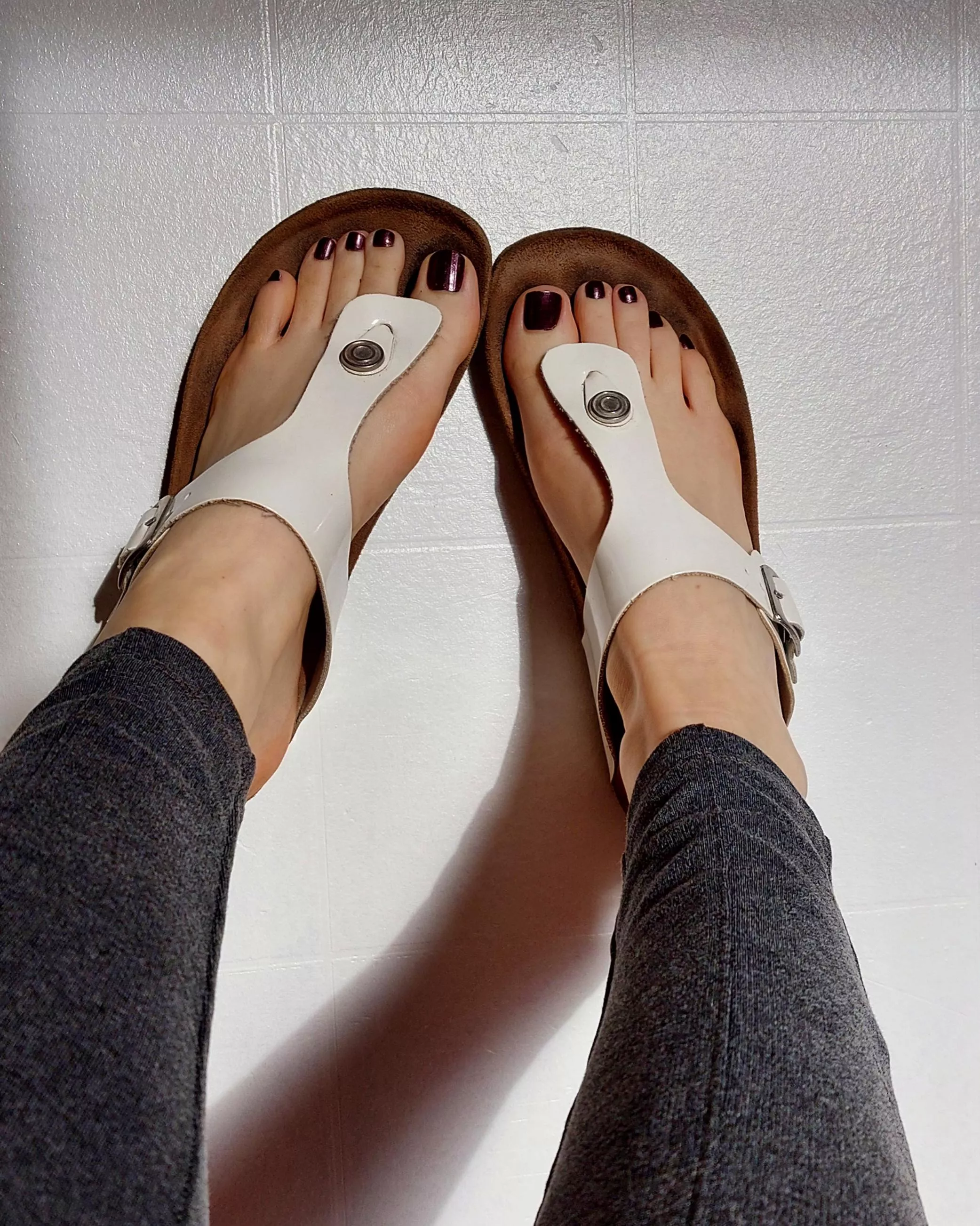 Enjoying the afternoon sun in my white sandals 