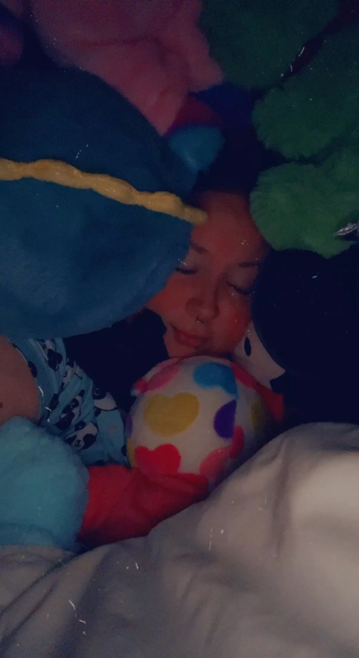 Hehe little hidden in stuffie mountain 🤭