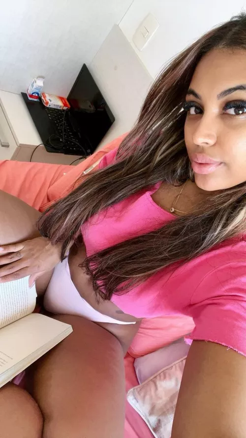 I am a girl next door who loves reading books.