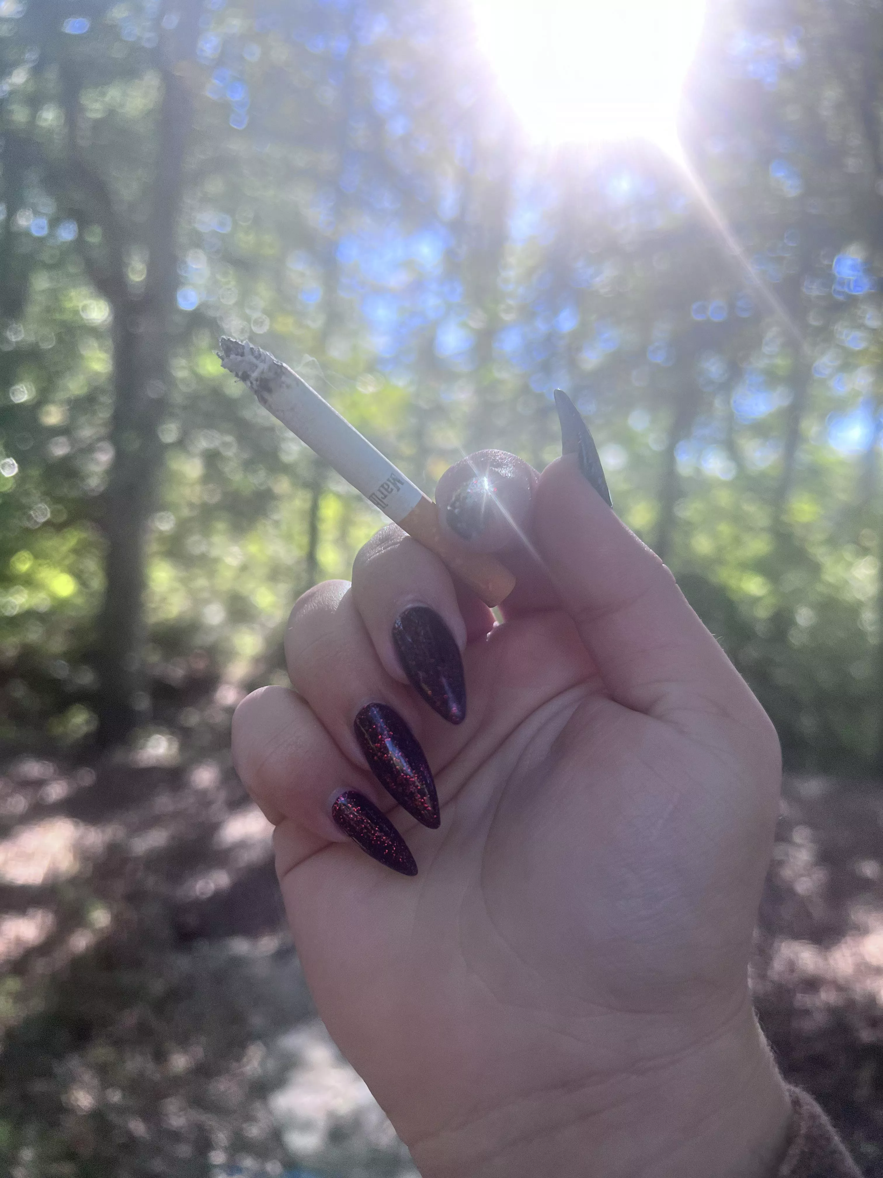 Is there anything better than long nails and a cigarette?