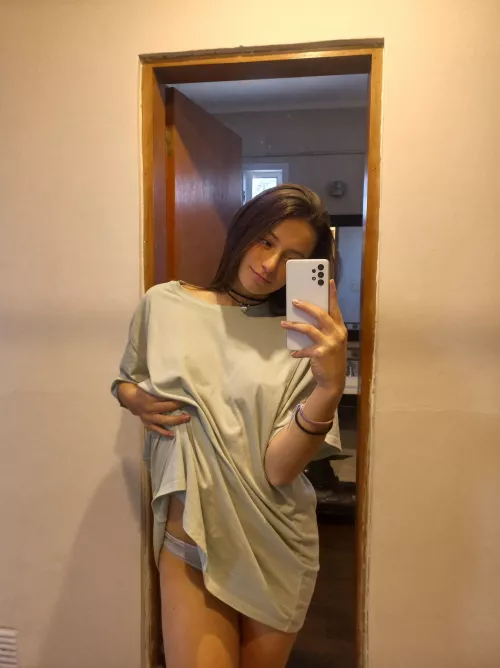 The shirt is too big for my tiny frame. How does it look on me?