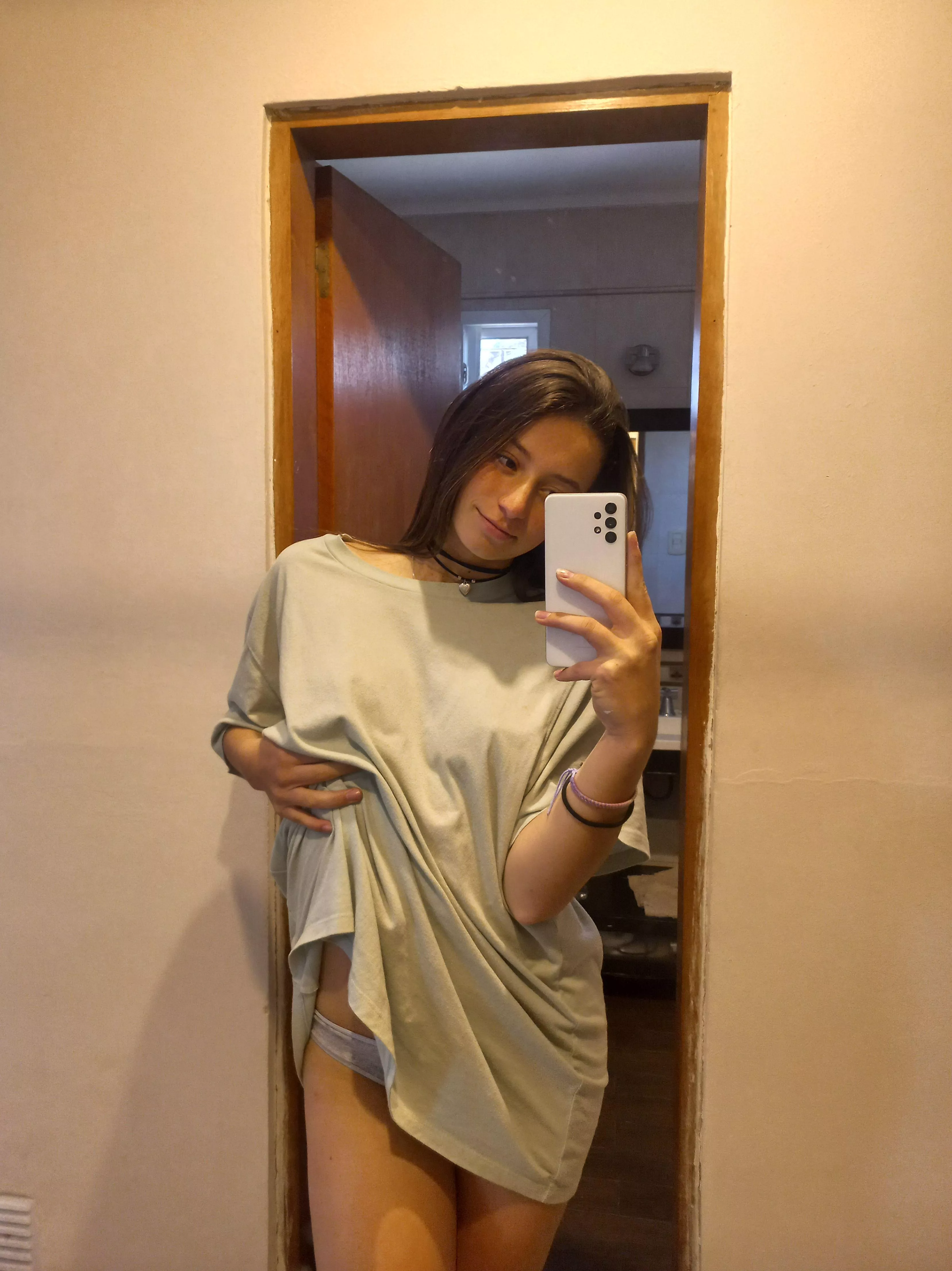 The shirt is too big for my tiny frame. How does it look on me?