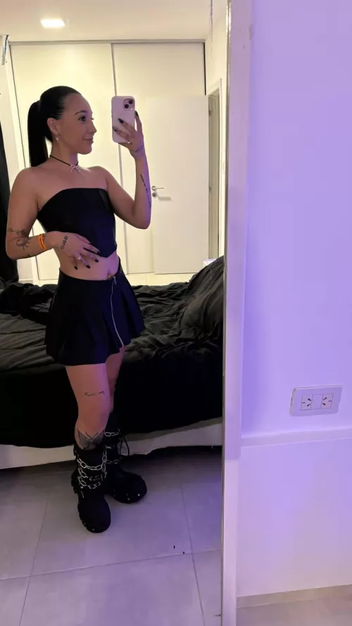 Just a regular girl trying on clothes in a changeroom...