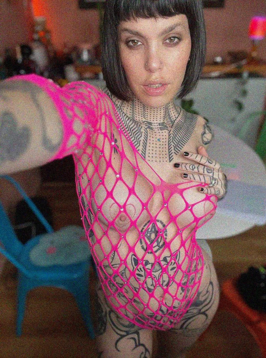 This fishnet is a bit different from my style, but it perfectly complements my tattooed nipples