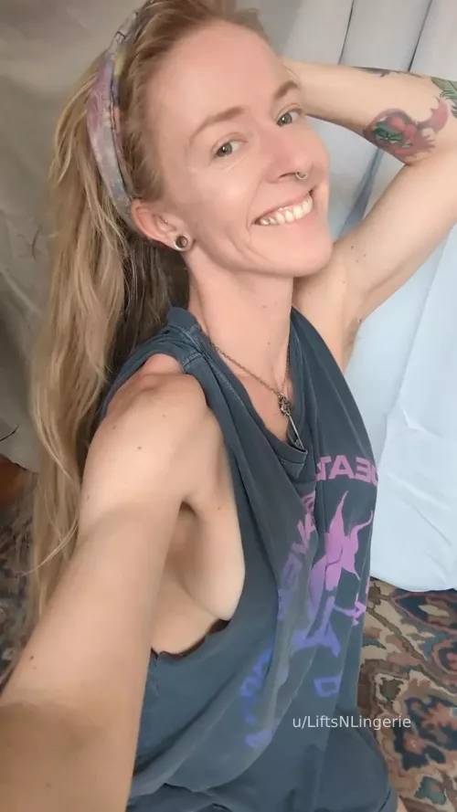 Big smile, nerdy tattoos, and a nice cut off...the trifecta.