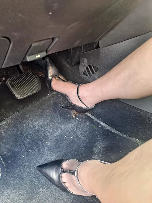 High heels on a car girl is a foot worshippers dream 