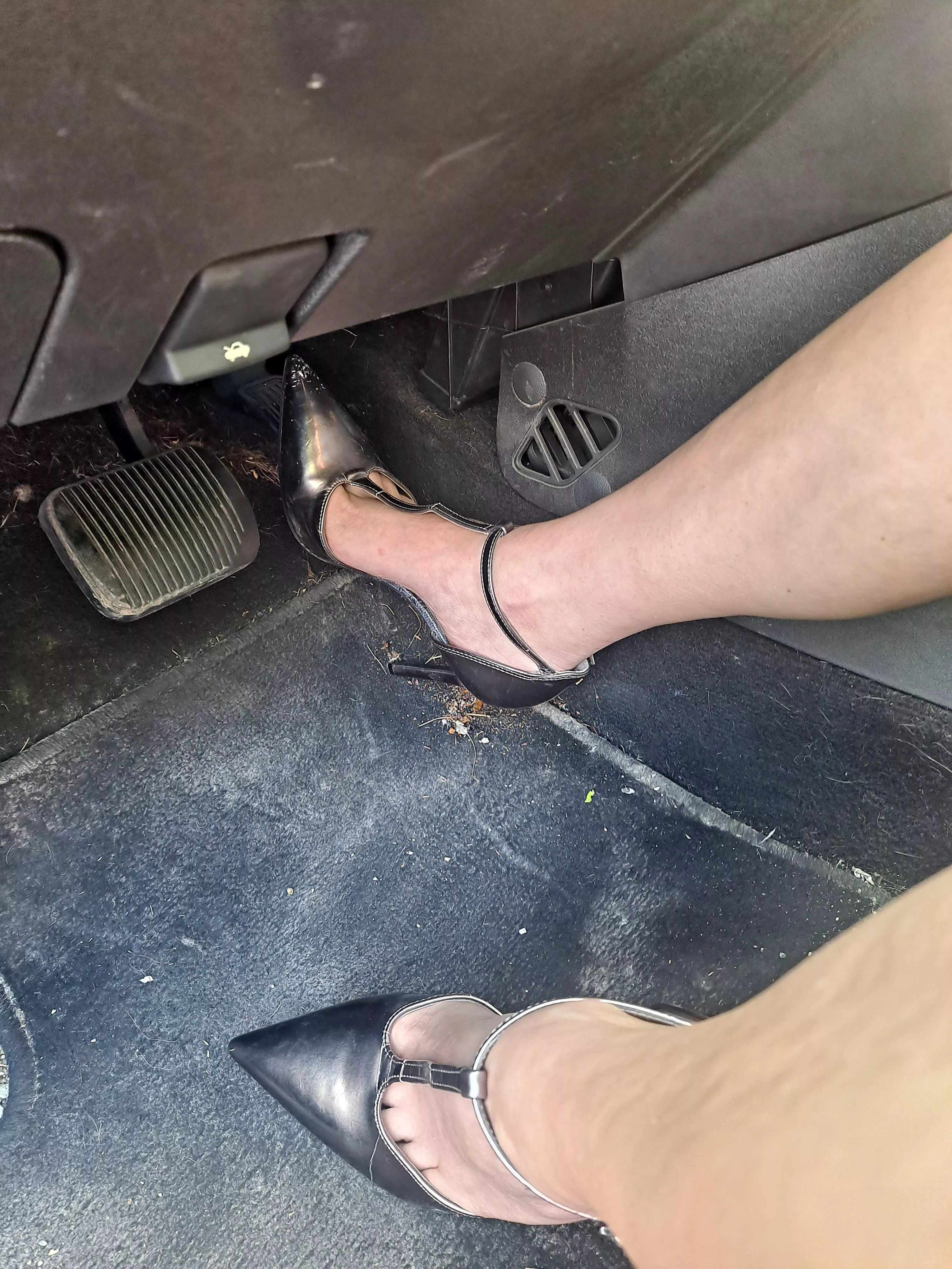 High heels on a car girl is a foot worshippers dream 