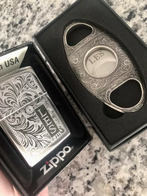 I know this is a long shot, but does anyone have the initials LES that would like this custom zippo and cutter?