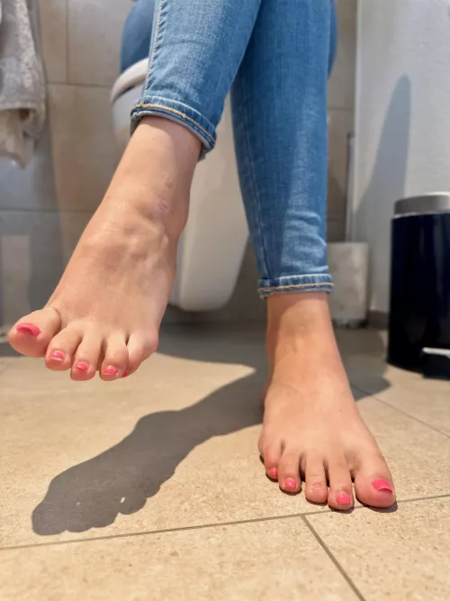 Sitting in the bathroom and showing my cute toes. Need some new nail polish haha