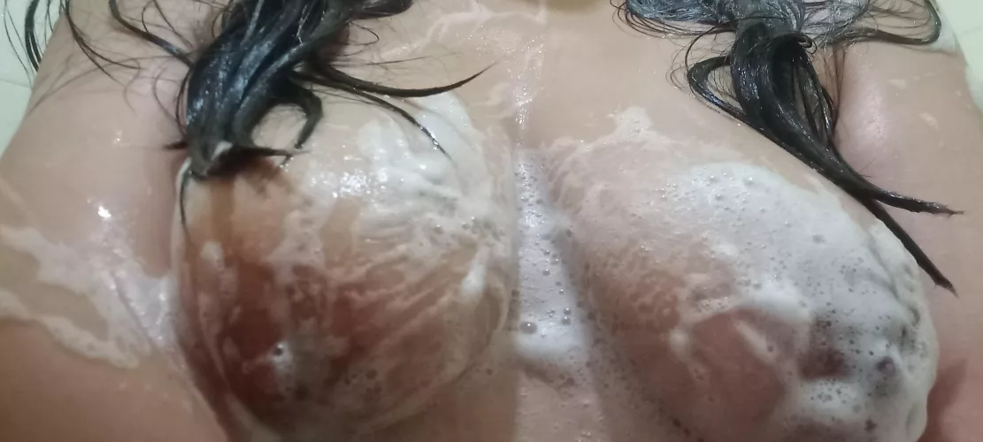 Hot brunette, taking a shower, do you want to help me soap up?