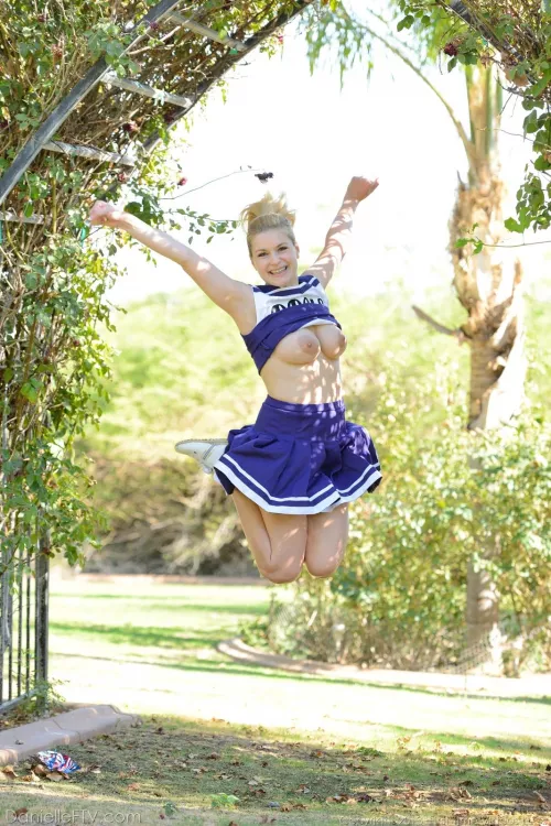 Topless Cheerleader Raises Spirits