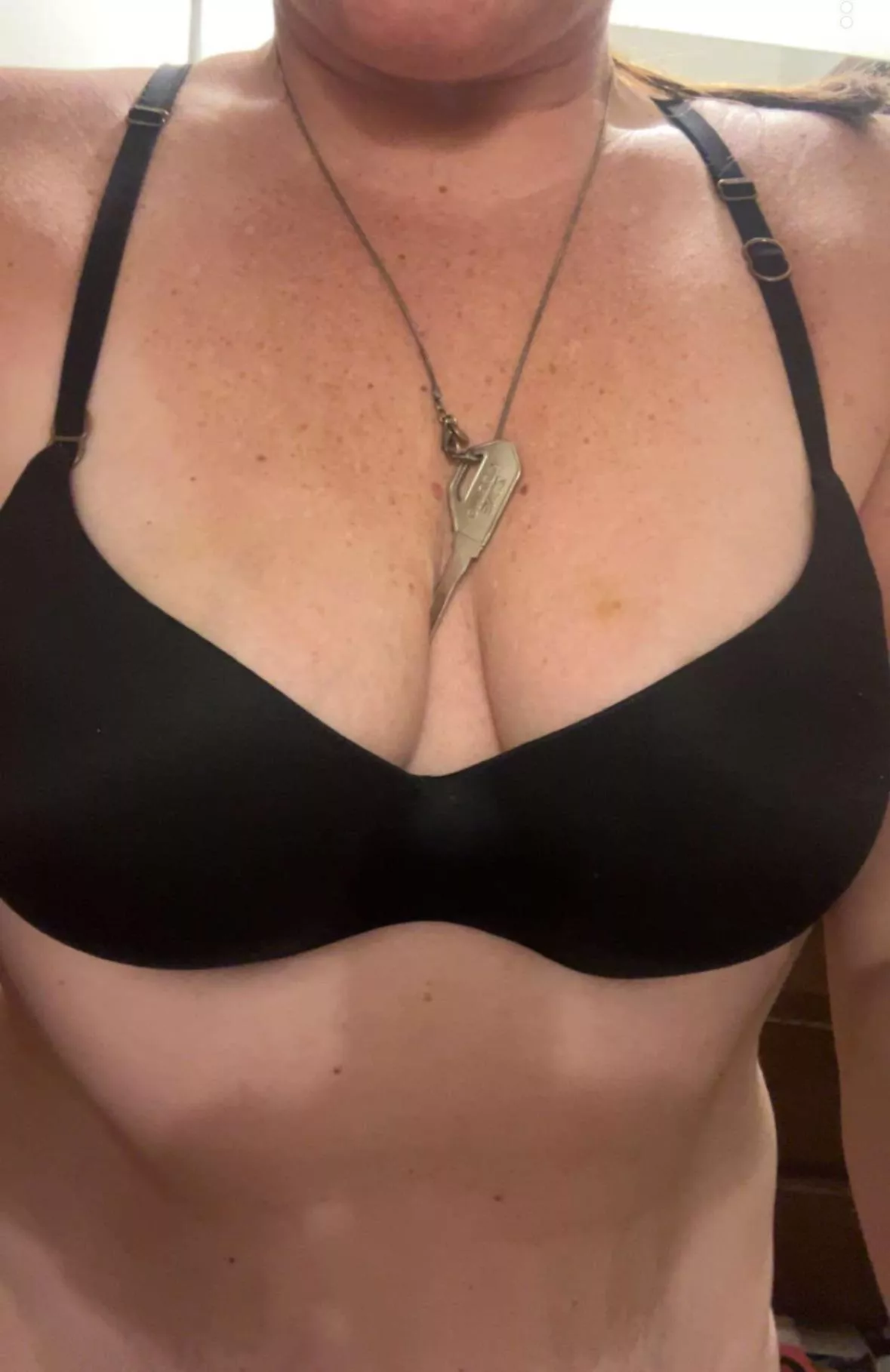 Wife teasing me with the key to my cage while I am on my way home. 