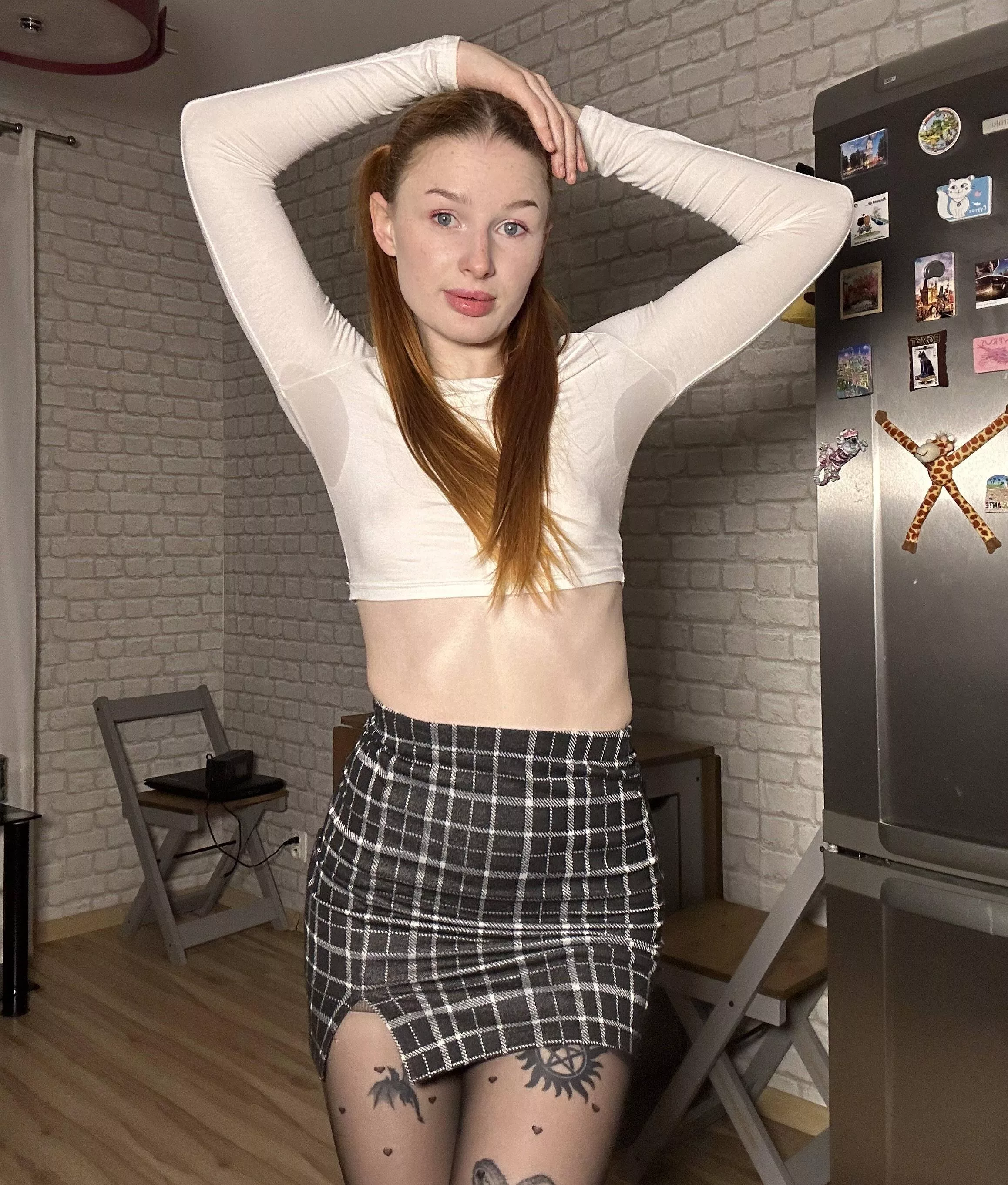 I'm wearing this little plaid skirt