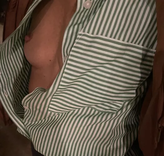 My wife shirt was open watching MNF at the Sports Bar. 