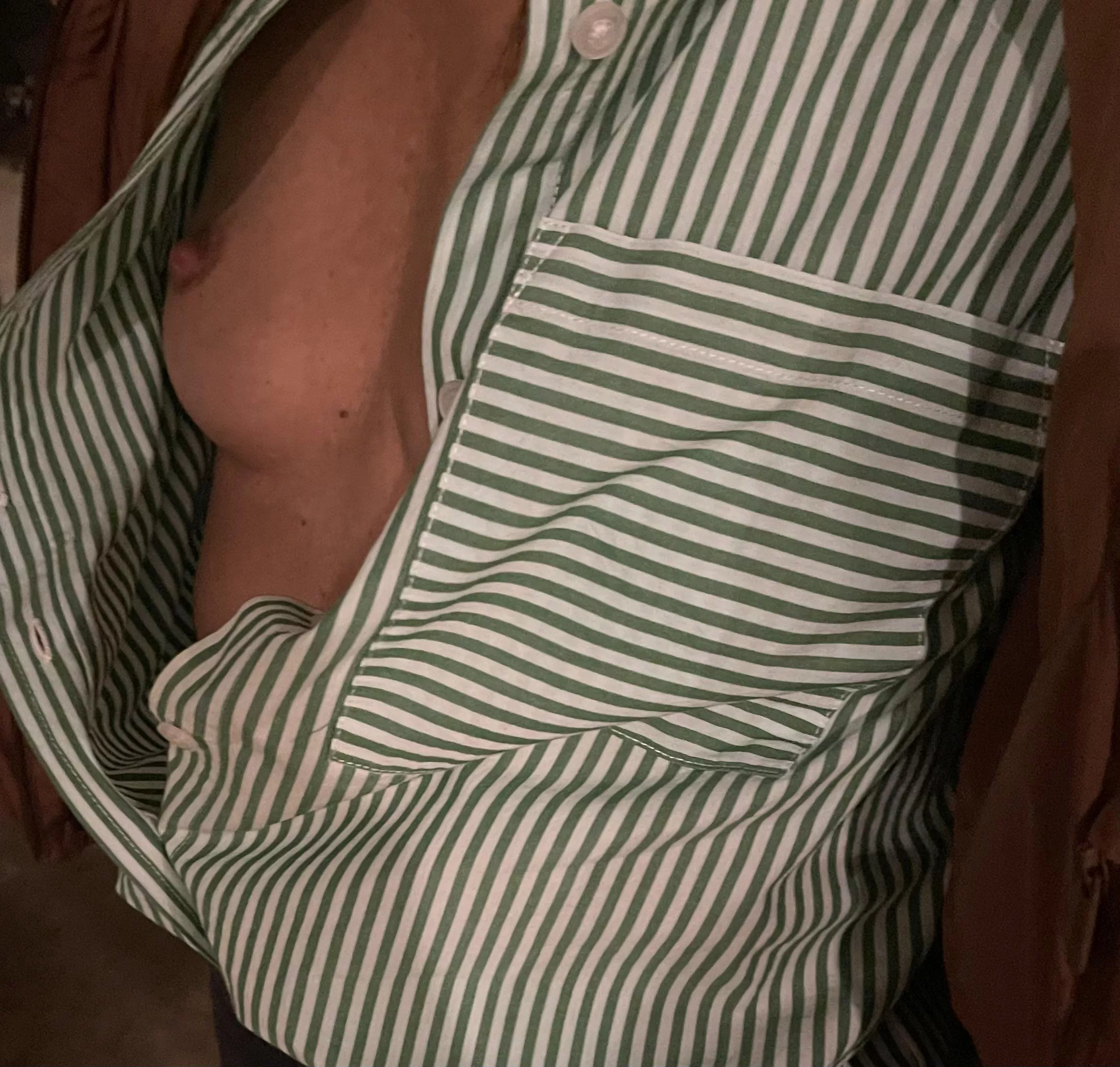 My wife shirt was open watching MNF at the Sports Bar. 