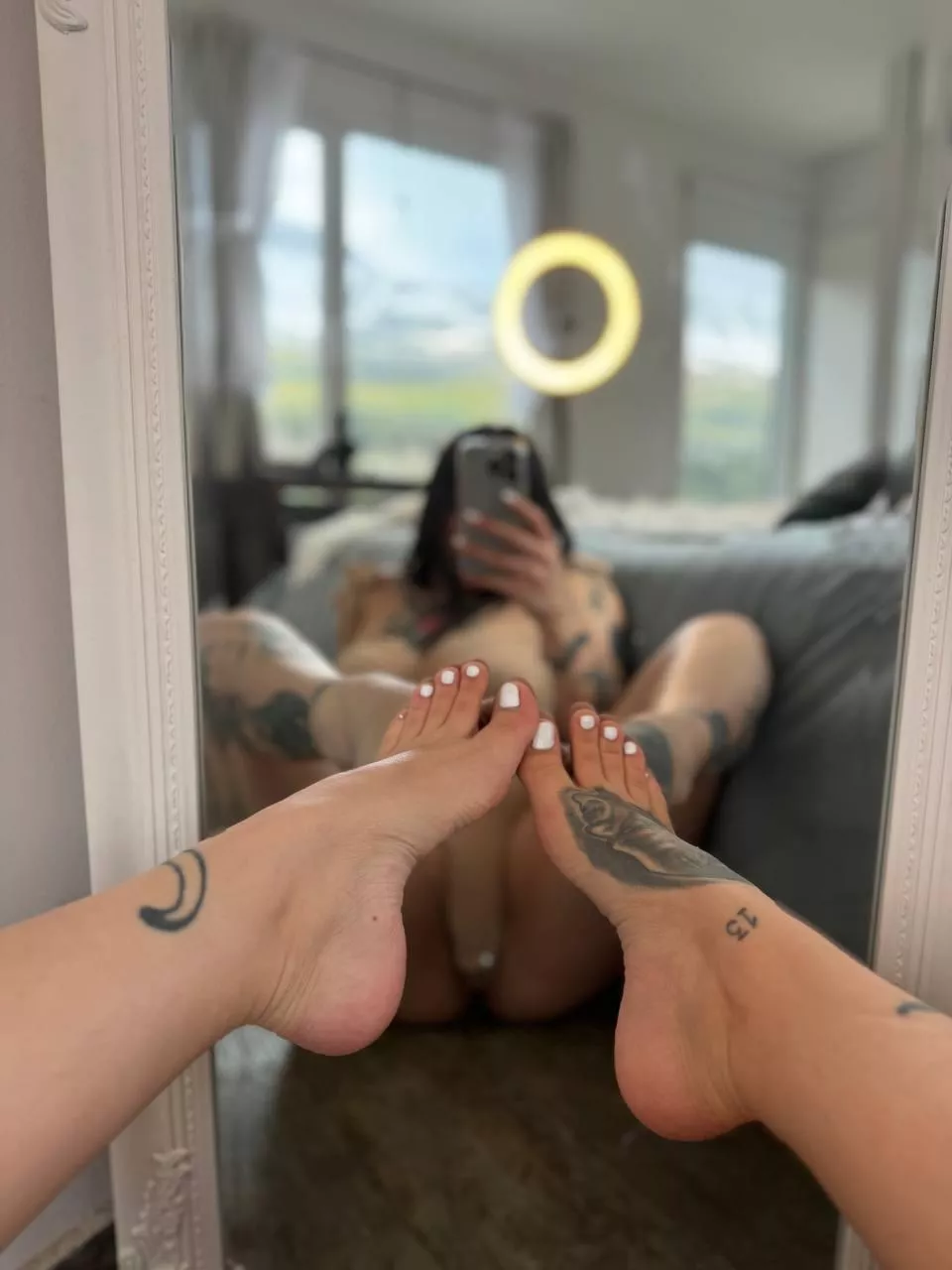 You like little tattooed feet with white toes?