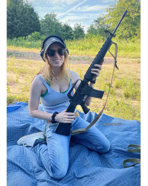 Blonde with Colt AR15 Sporter