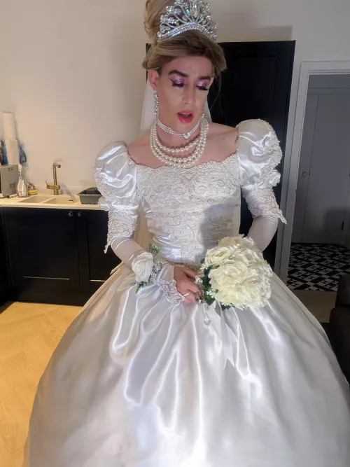 Can you guess what's underneath the wedding dress? 