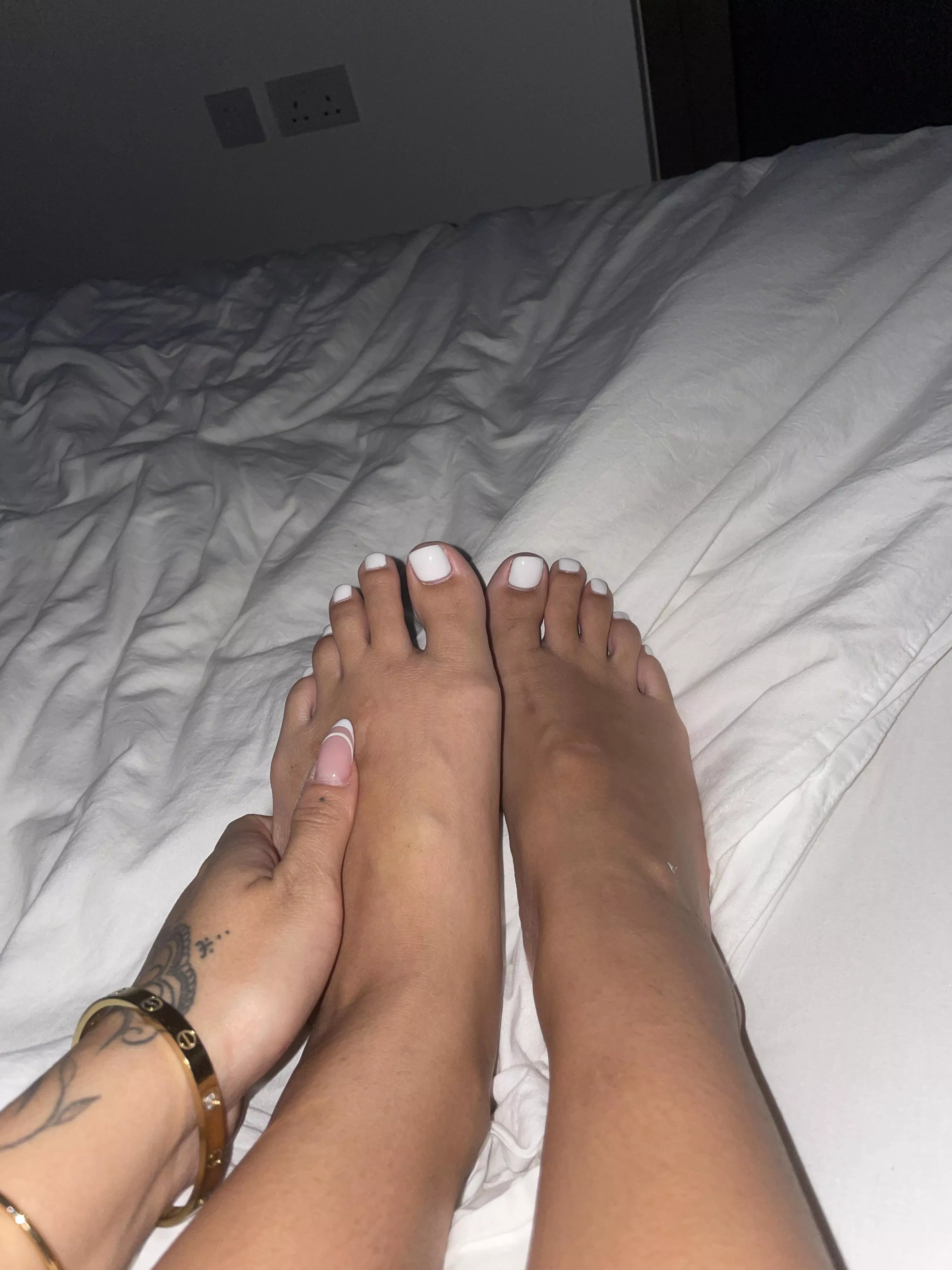 Freshly done pedi. Do you like white toes. What would you do to my feet.