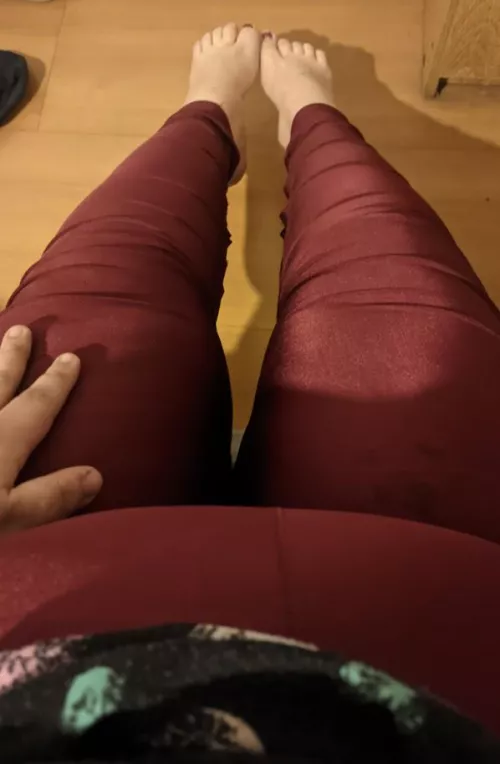 Red yoga pants and feet. Where would you put your head first?