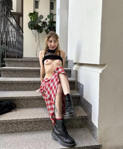 rough boots and bare breasts