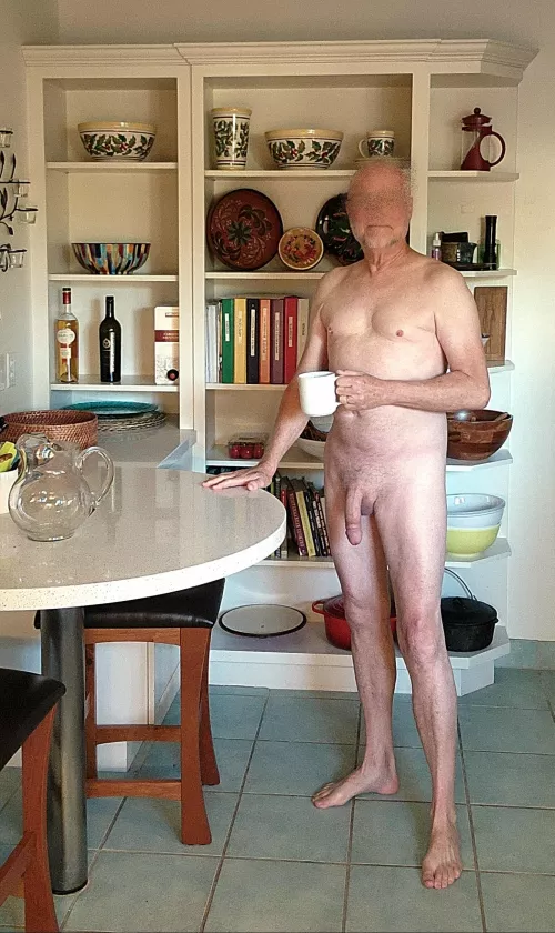Washing the dishes and making coffee. Always naked unless it's just too cold.