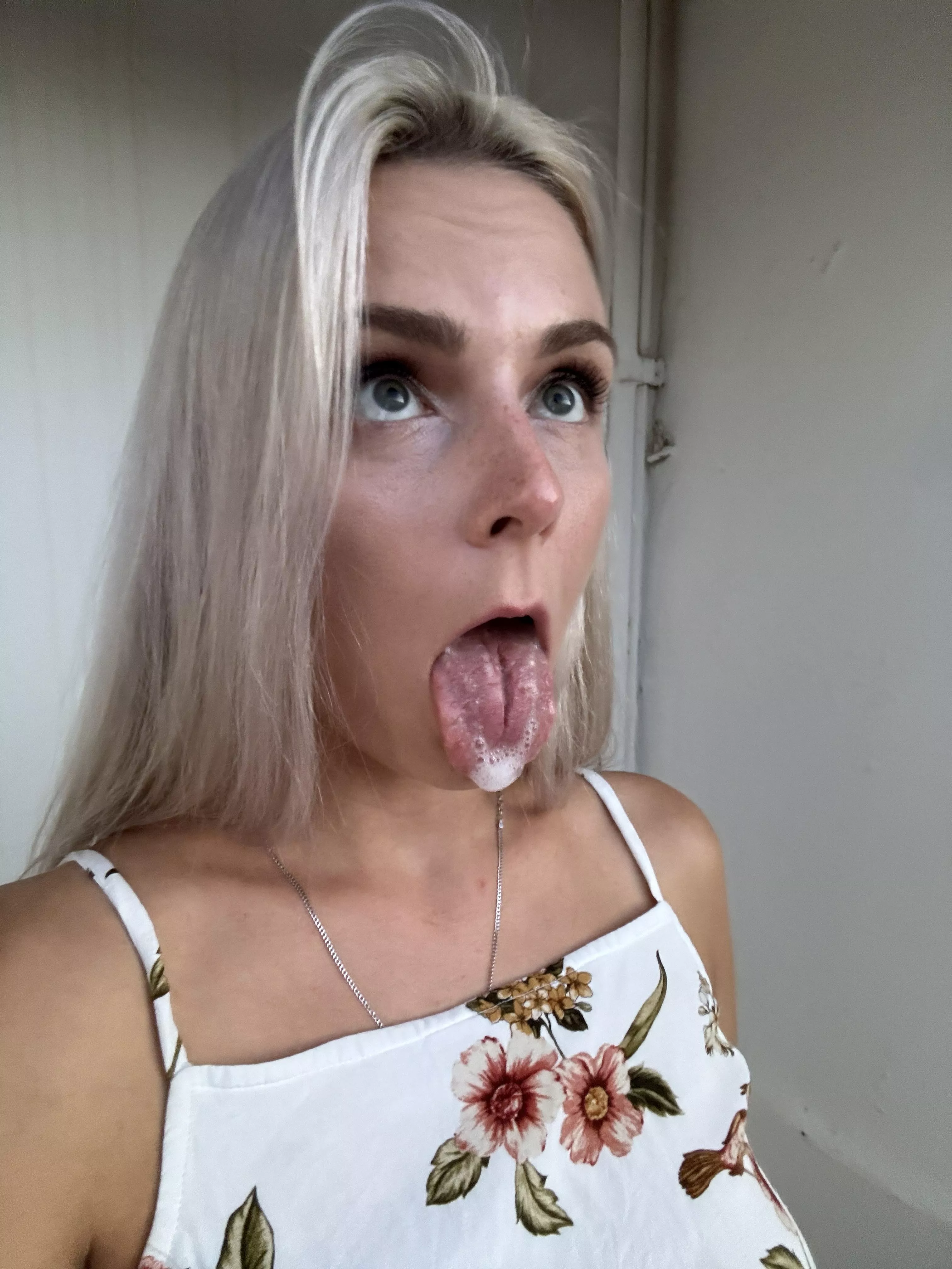 Blonde milf with a big tongue