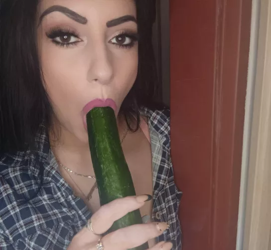 Enjoying every bite of this cucumber, wish you were here
