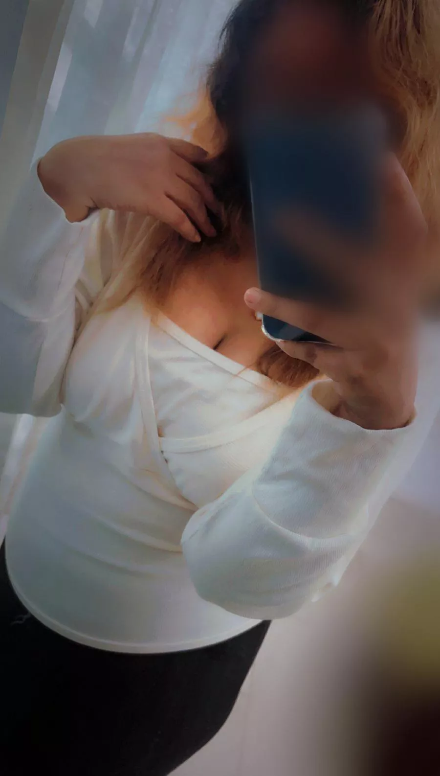 Finger between the cleavage...