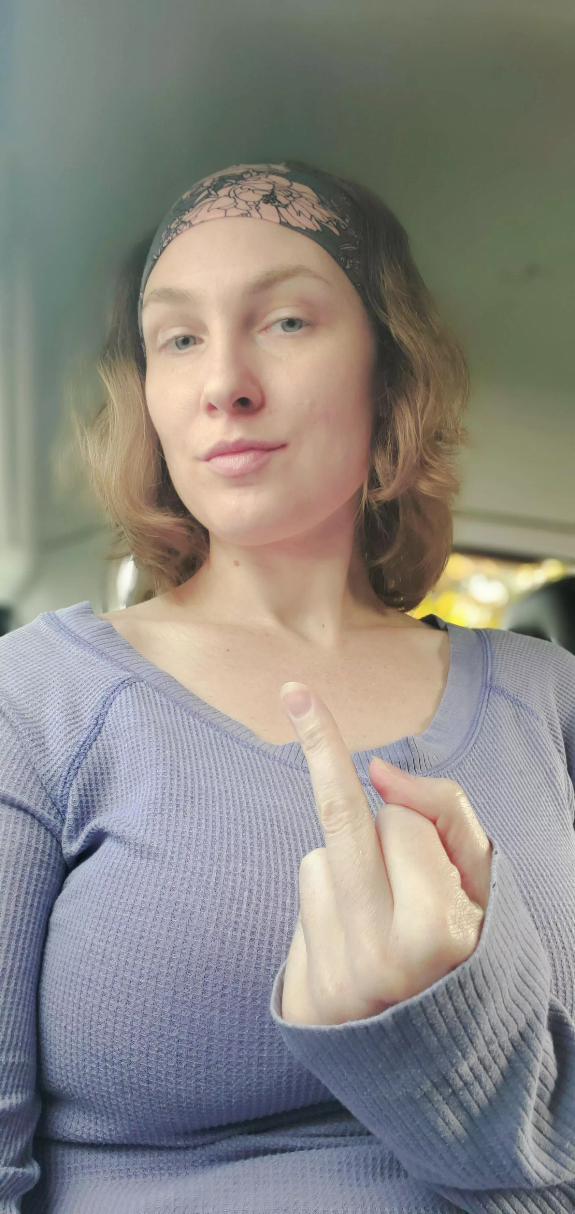 Flipping you off in the back of a Lyft (say thank you) 😘