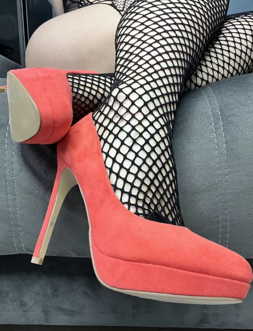 Mesh legs and red heels will drive you crazy