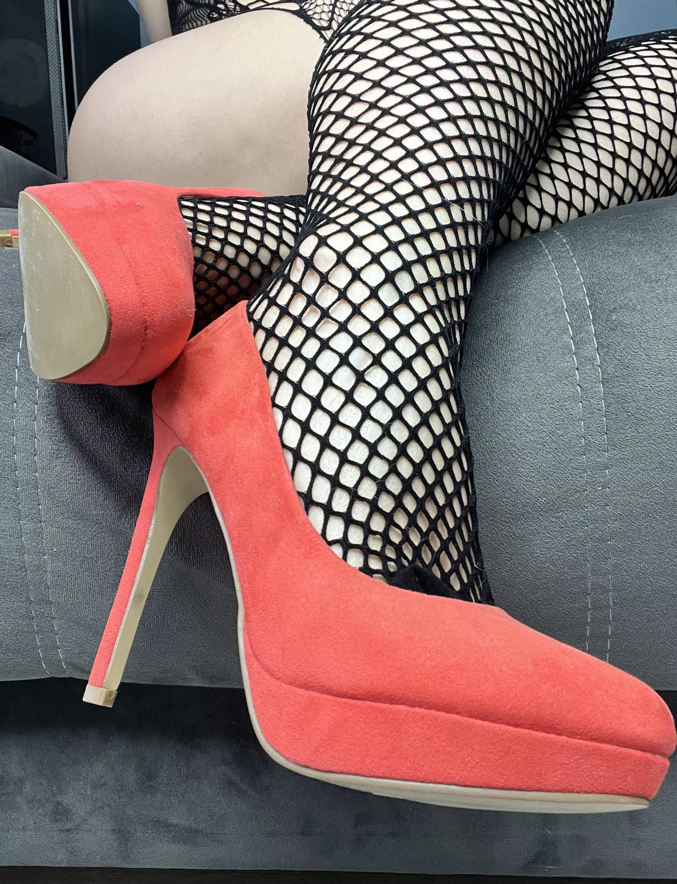 Mesh legs and red heels will drive you crazy