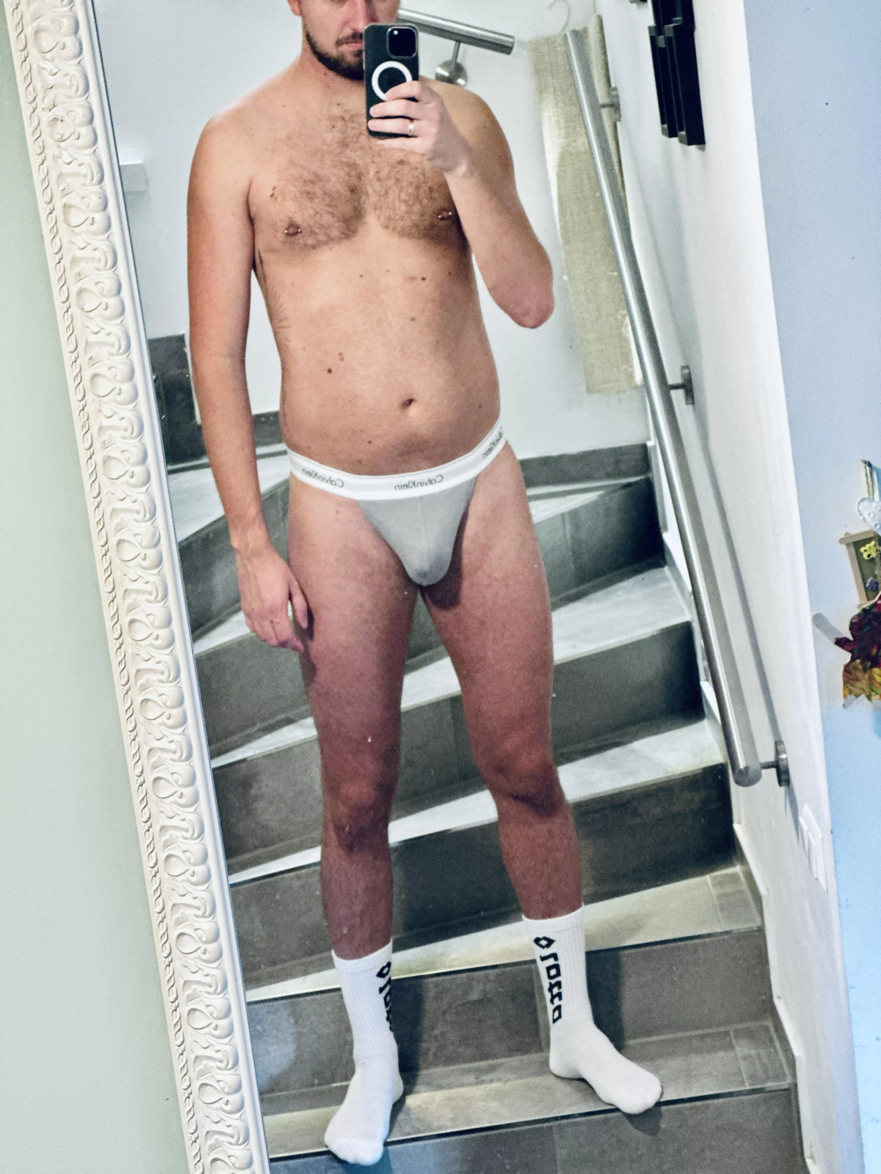 White socks and cock in a thong