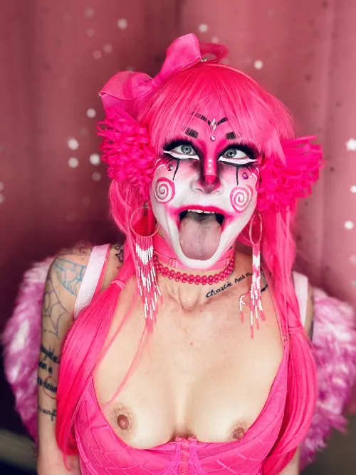 Forever the flamingo in a flock of pigeons 