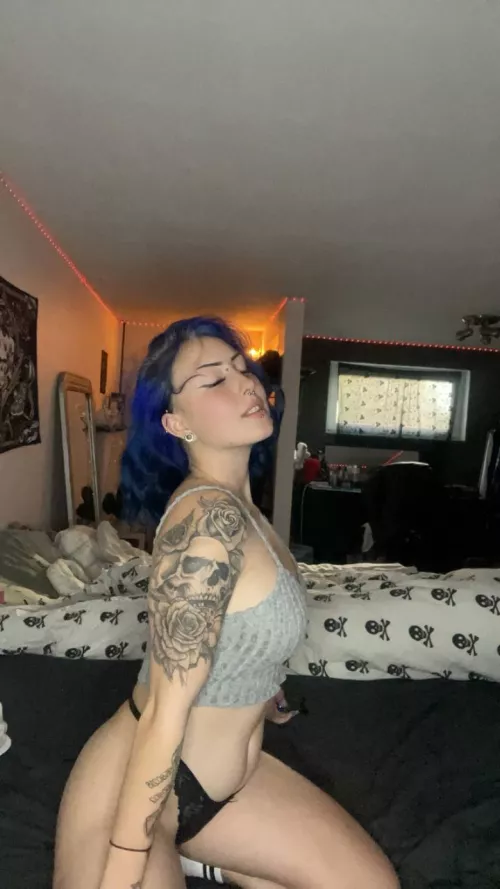 Is blue hair and tattoos your type?