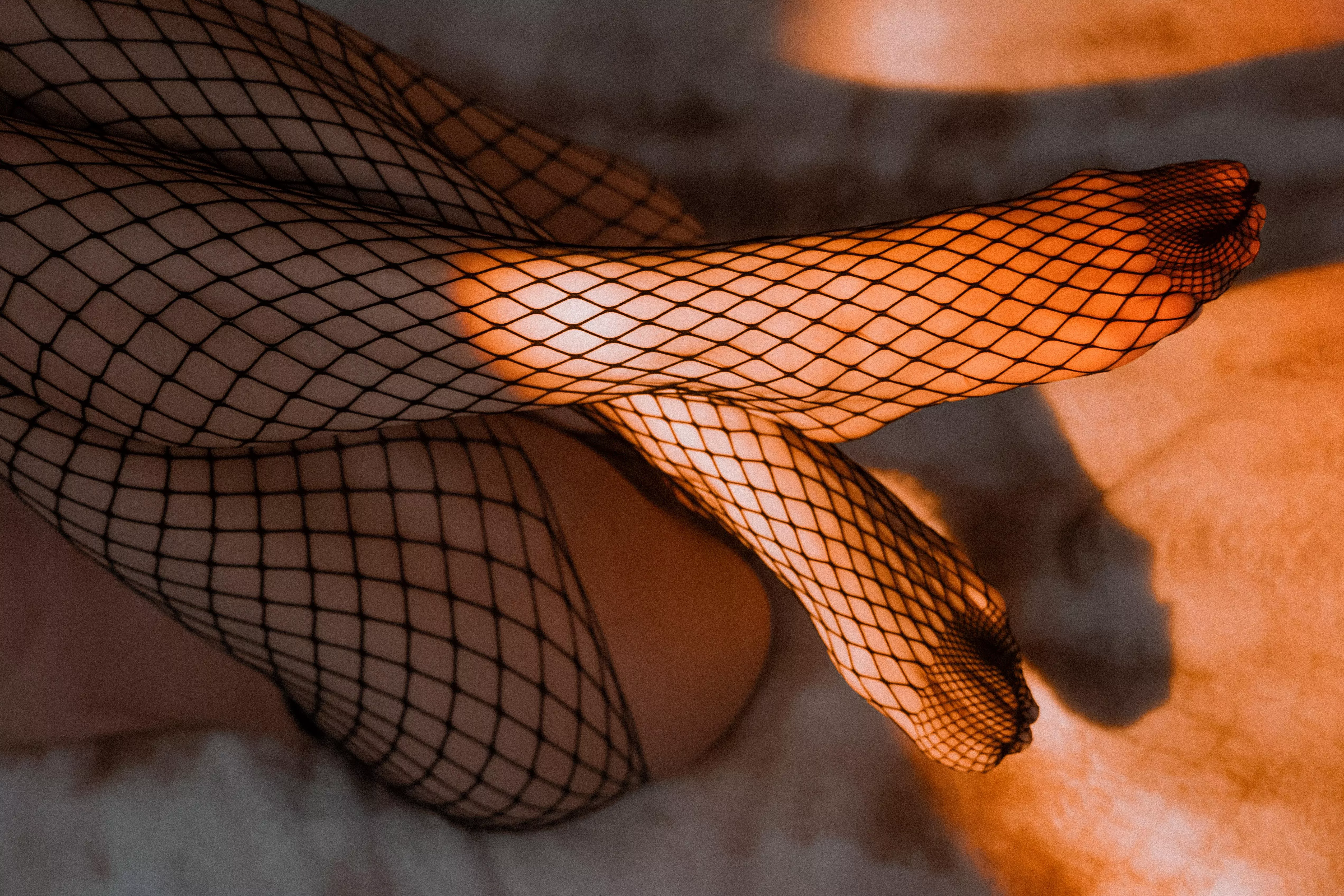Classy feet in fishnets